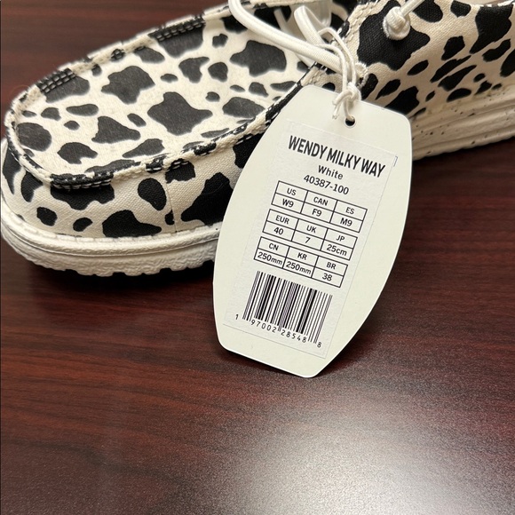 Hey Dude women’s Cow Print Sneakers - Picture 2 of 4
